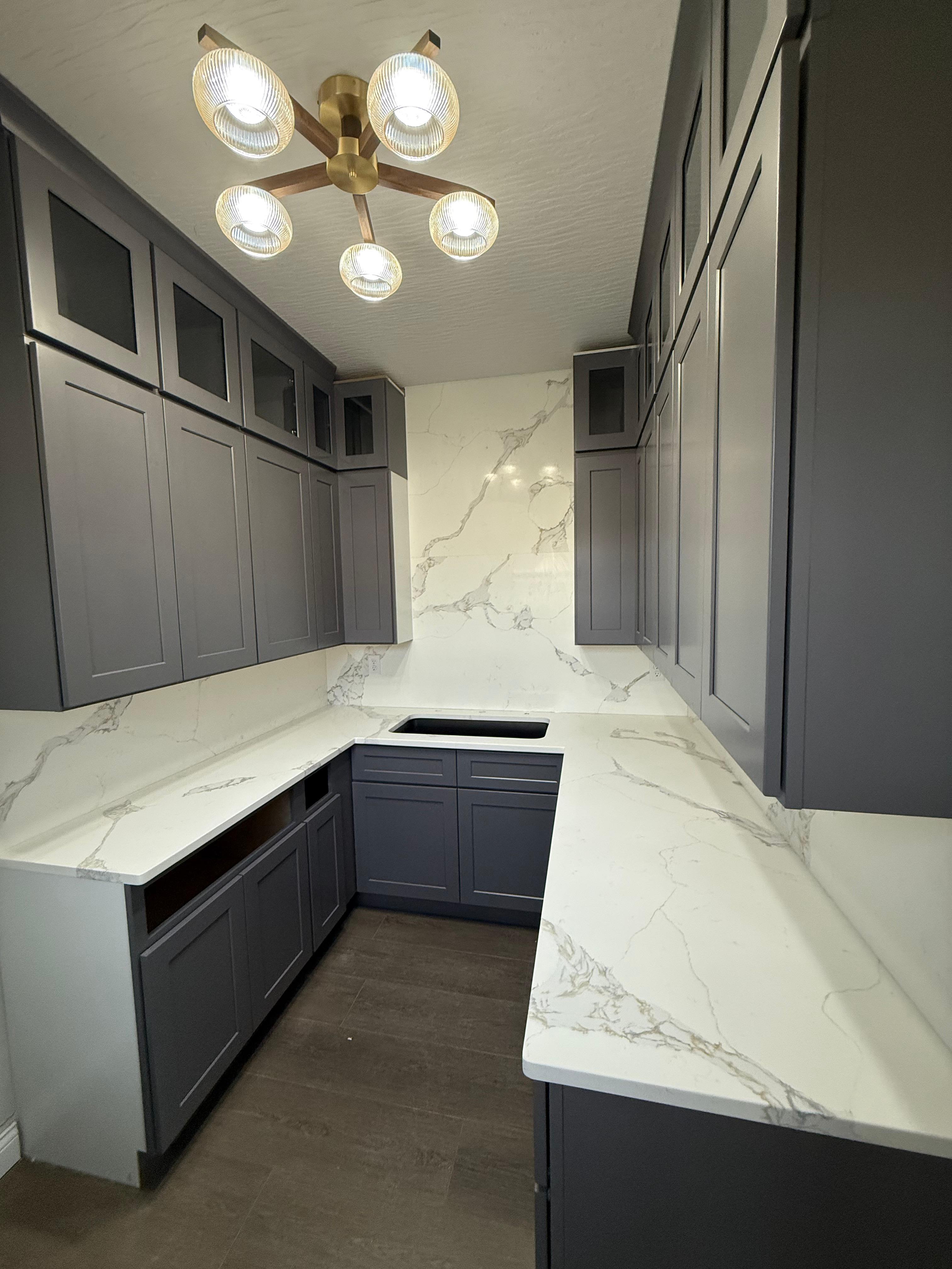 Luxury kitchen with island and marble countertop